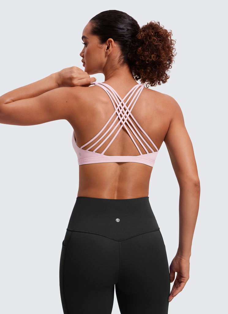 CRZ YOGA Women's Yoga Light Support Nakedfeel Strappy Bra Low Cut Strawberry Pink