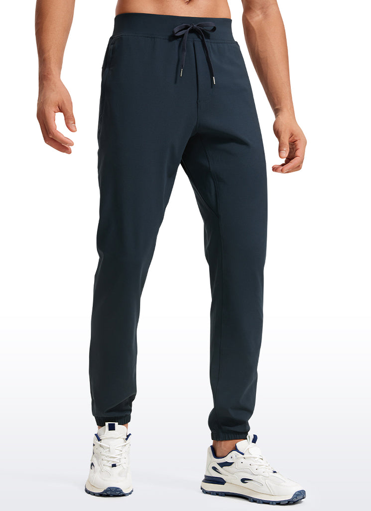 CRZ YOGA Men's Run Slim Fit On the Travel Joggers 30''- Ankle Zipper Black