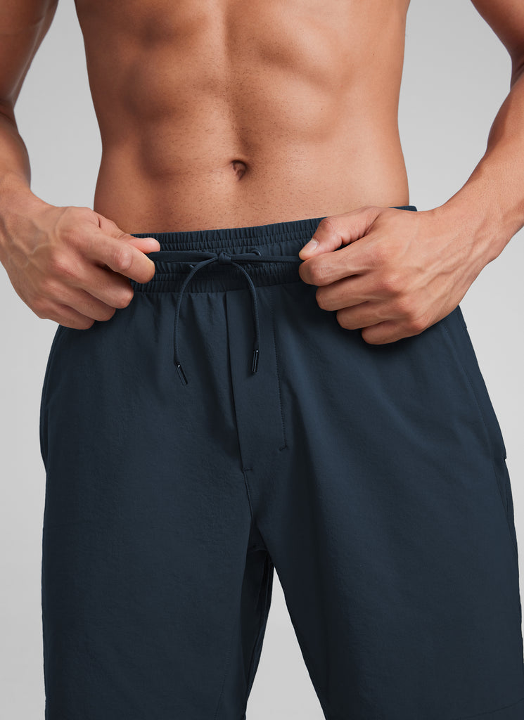 CRZ YOGA Men‘s Workout Water Resistant Short 7" with Zip Pockets True Navy