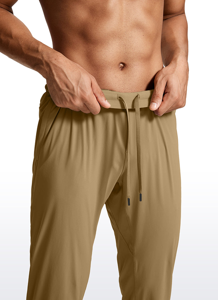 CRZ YOGA Men's Running Slim Fit Lightweight Joggers 31"-Zipper Pockets Artifact Brown