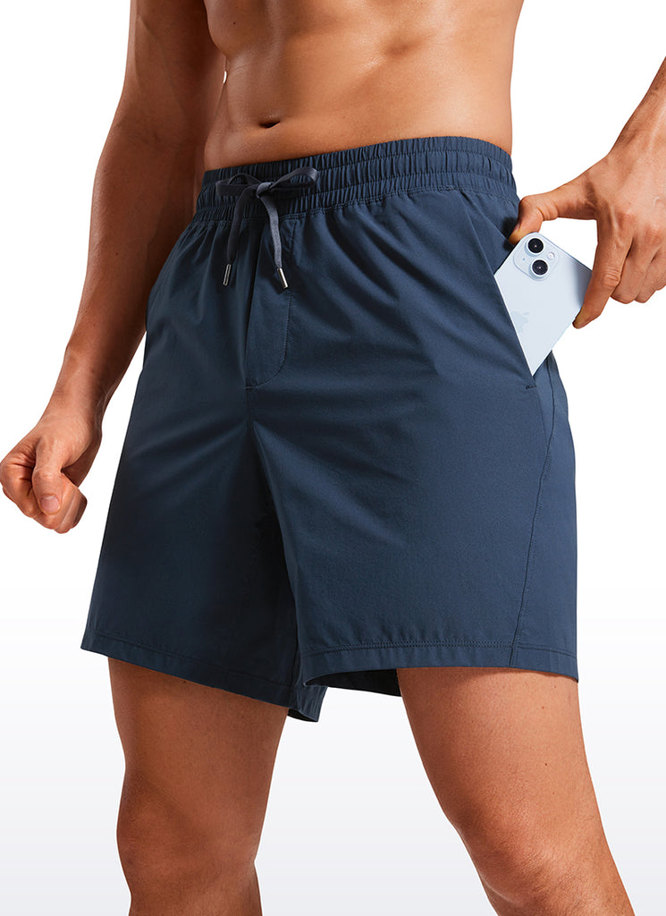 CRZ YOGA Men's Training Quick Dry Pocketed Linerless Shorts 7'' Stelindigo