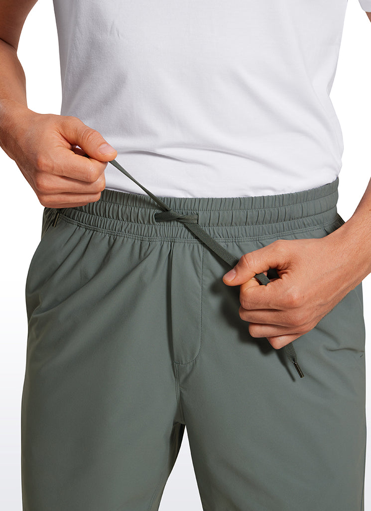 CRZ YOGA Men's Training Quick Dry Pocketed Linerless Shorts 7'' True Navy