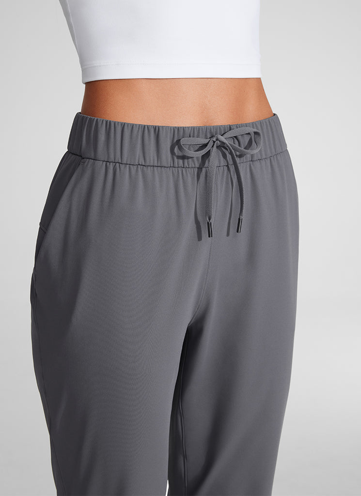 CRZ YOGA Women's Travel Slim Fit Stretch Drawstring 7/8 Pants 27'' Ink Gray