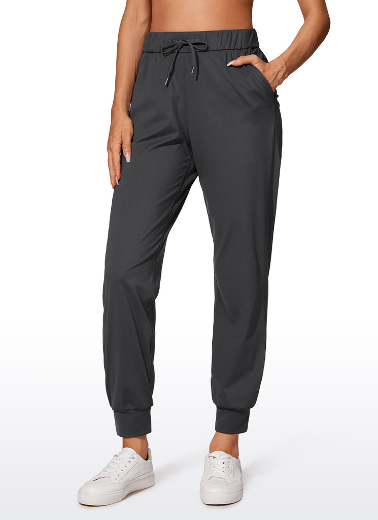 CRZ YOGA Women's Travel Slim Fit Stretch Drawstring Jogger 27'' Ink Gray