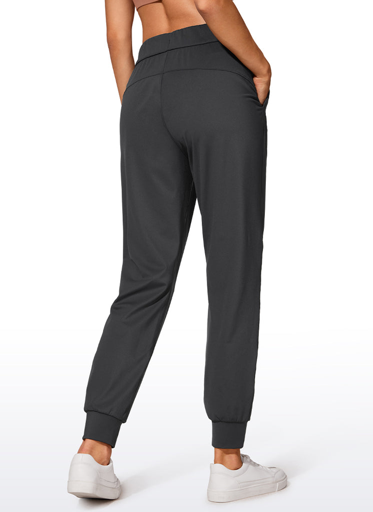 CRZ YOGA Women's Travel Slim Fit Stretch Drawstring Jogger 27'' Ink Gray