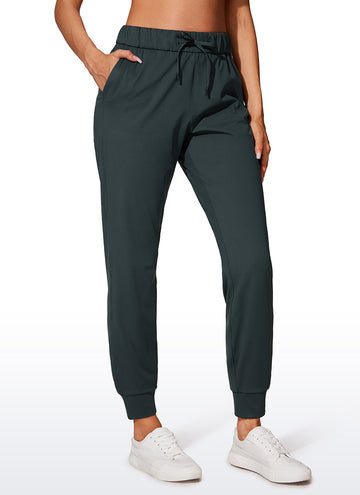 CRZ YOGA Women's Travel Slim Fit Stretch Drawstring Jogger 27'' Melanite