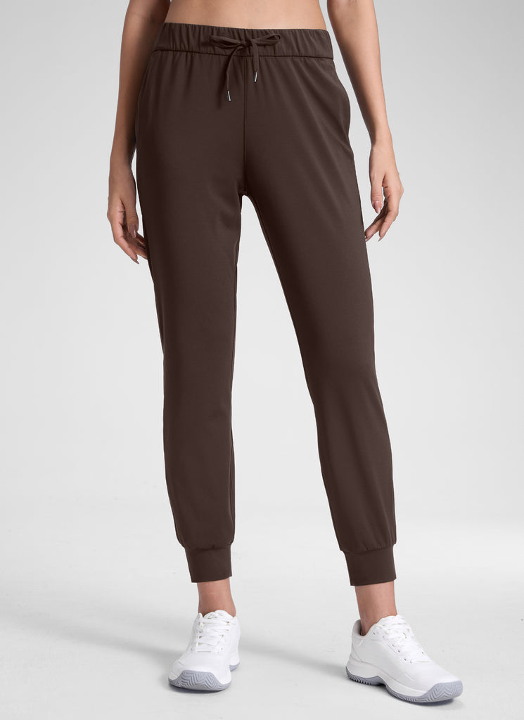 CRZ YOGA Women's Travel Slim Fit Stretch Drawstring Jogger 27'' Milky White