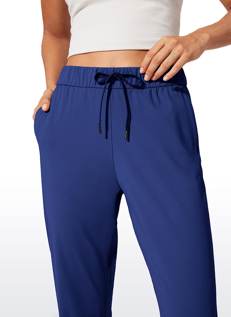 CRZ YOGA Women's Travel Slim Fit Stretch Drawstring Jogger 27'' Larkspur Blue