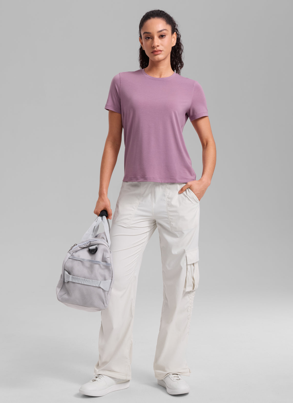 CRZ YOGA Women's Quick Dry Workout Crewneck Hip Length Short Sleeve Light Lavender @model_info:Larissa