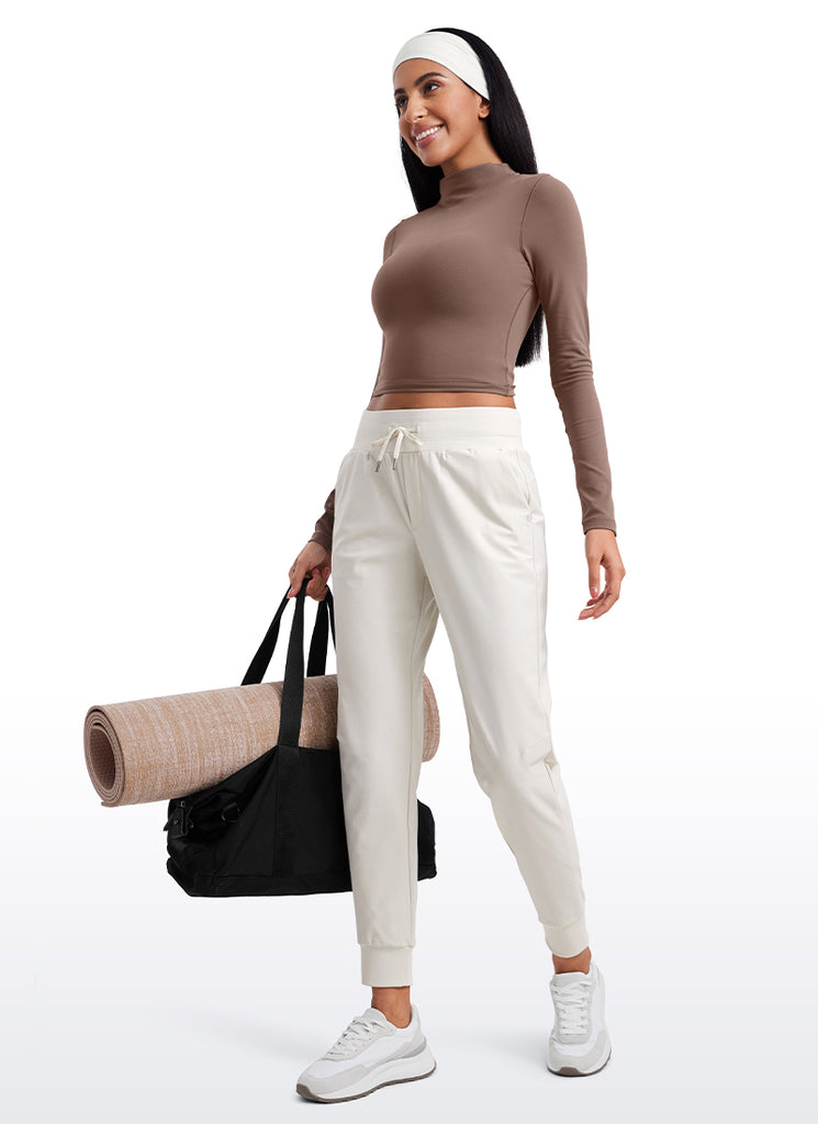 CRZ YOGA Women's Golf All-day Slim-Fit Joggers 27.5'' with pockets Milky White