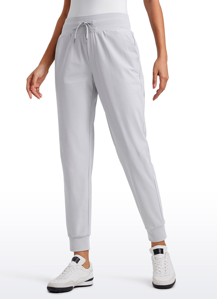 CRZ YOGA Women's Golf All-day Slim-Fit Joggers 27.5'' with pockets Mysterious Grey