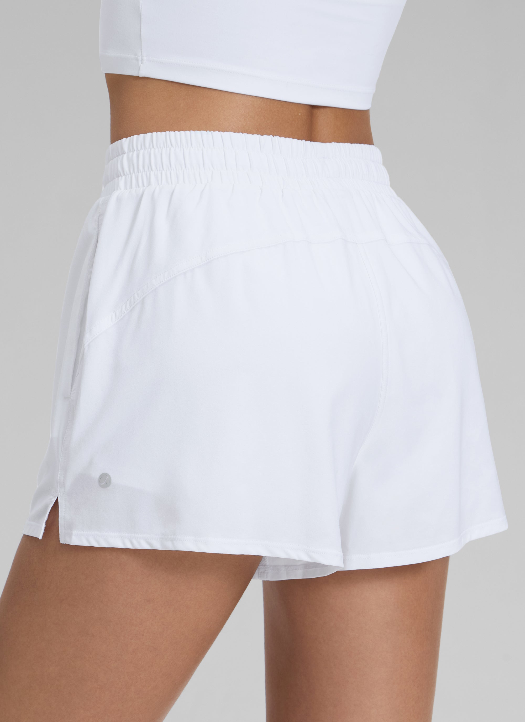 CRZ YOGA Women's Casual Regular Fit High Rise Tennis 2 in 1 Shorts White @model_info:Jenna