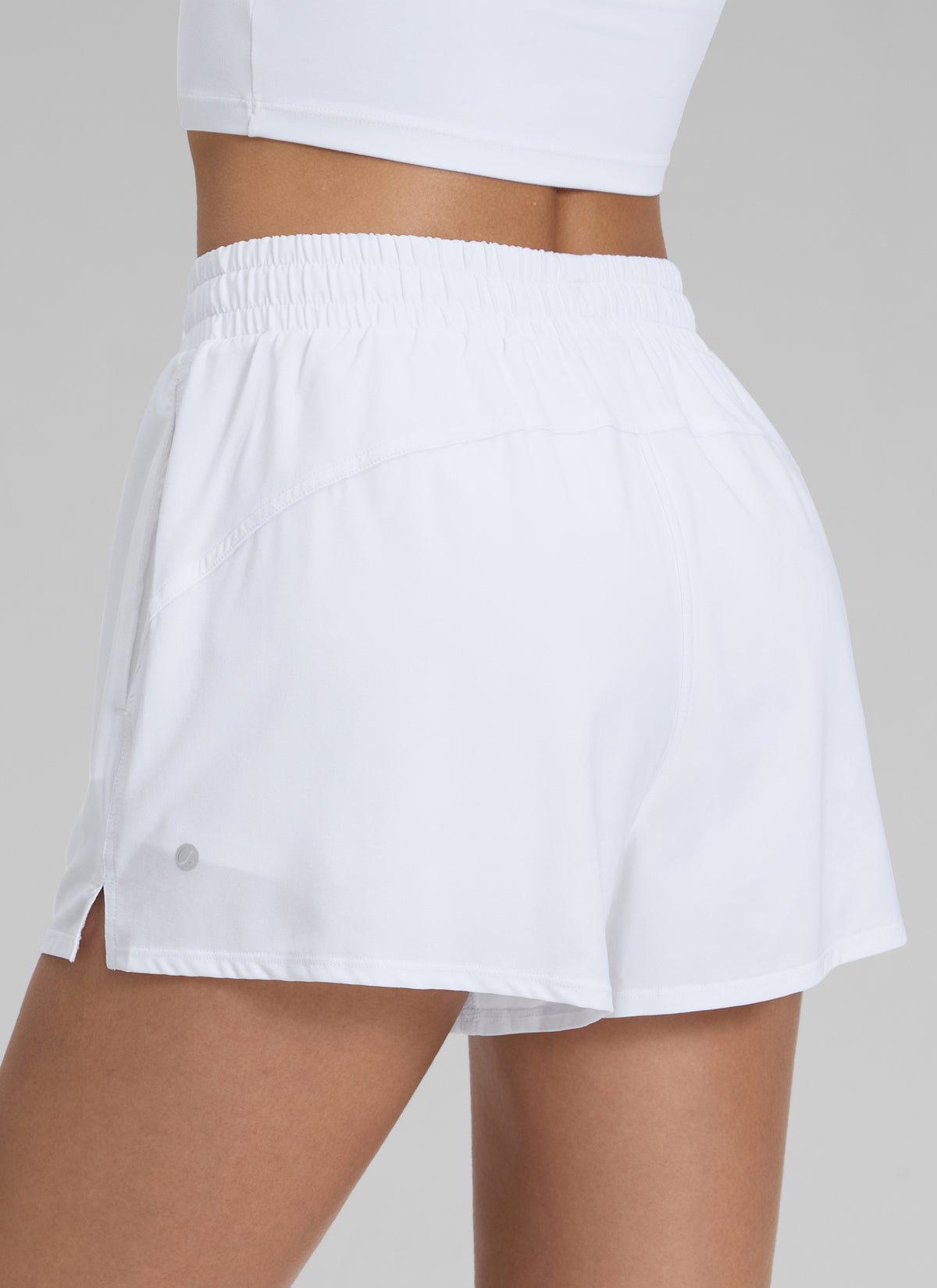 CRZ YOGA Women's Casual Regular Fit High Rise Tennis 2 in 1 Shorts White @model_info:Jenna