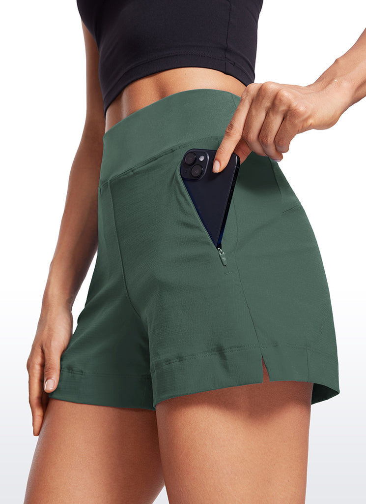 CRZ YOGA Women's Hiking Ripstop Mid-Rise Hiking Shorts Zip Pockets 4'' Dark Forest Green