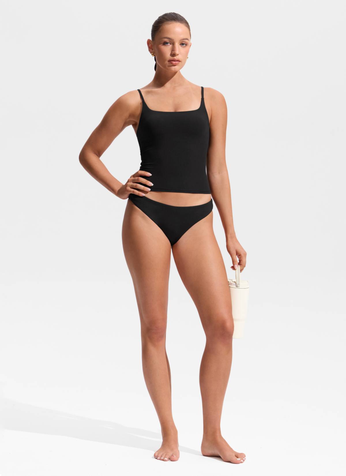 CRZ YOGA Women's Swimwear U Neck Twist Back Tankini Top Black @model_info:Hannah