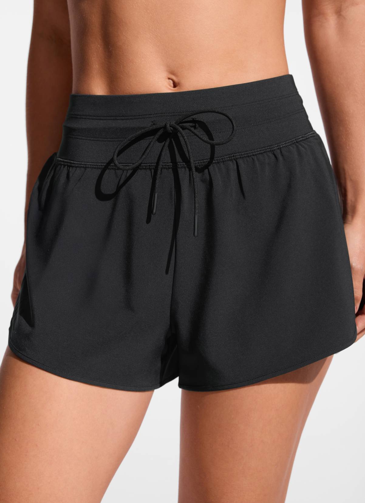 CRZ YOGA Women's Swimwear Feathery-Fit Split Dolphin Swim Shorts 2.5'' Black